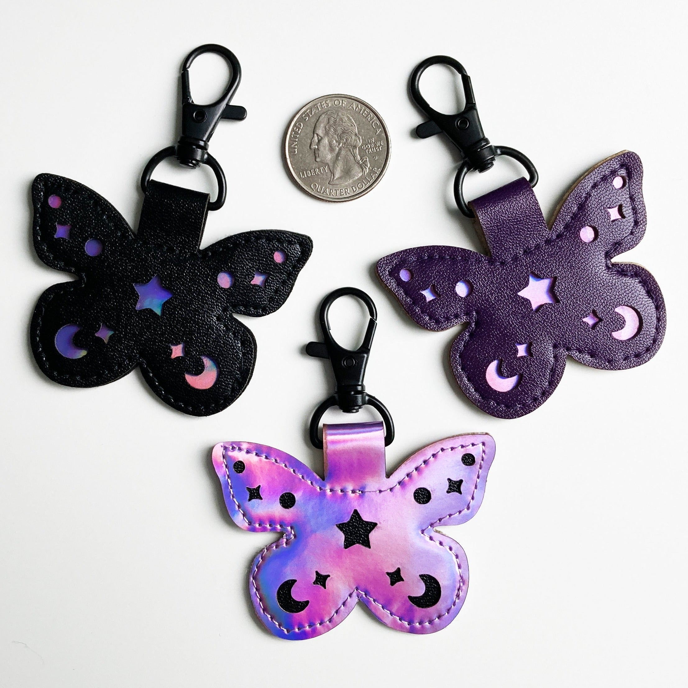 Mystic keychain purple resin with gold flakes. Mystic symbols keychains. Moon  keychain. Butterfly keychain. Heart string keychain.